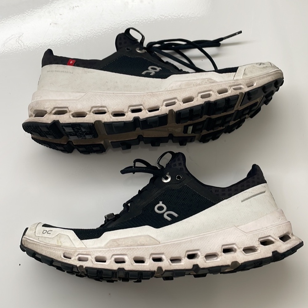 On Running Black and White Sneakers